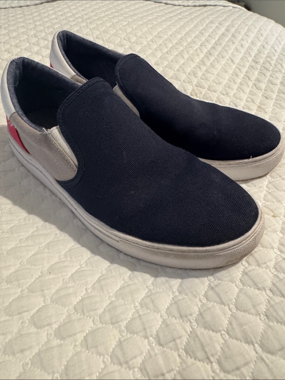 Tommy Hilfiger Navy Canvas Slip-On Sneakers with White Soles and Red Heel Accent